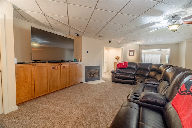 18515 Dream Catcher, Garfield, AR 72732 - carpeted living room with ceiling fan, a drop ceiling, and a fireplace