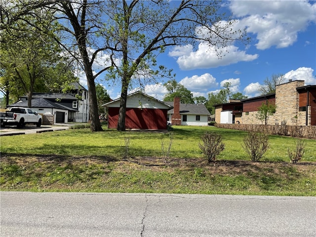 exterior space with a front lawn