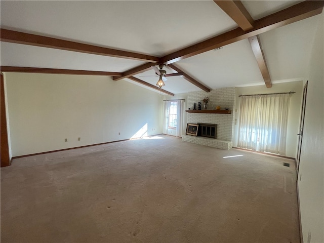 unfurnished living room featuring lofted ceiling with beams, light carpet, ceiling fan, and a fireplace