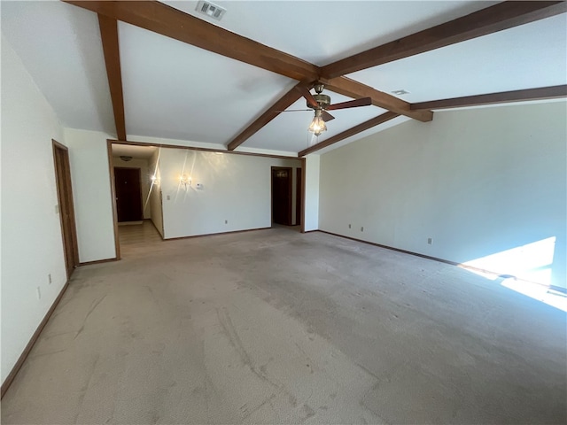 unfurnished room with light colored carpet, ceiling fan, and lofted ceiling with beams