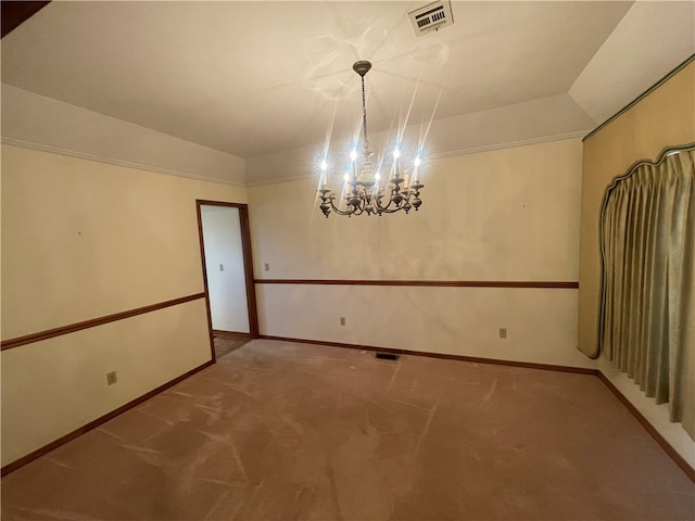 unfurnished room with a chandelier and dark colored carpet