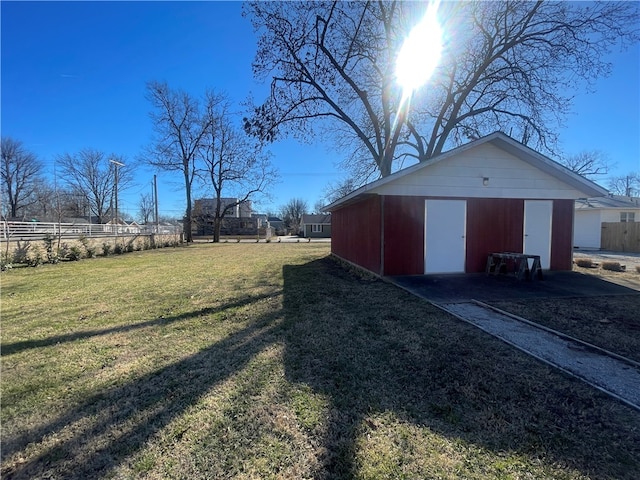 view of shed / structure featuring a yard