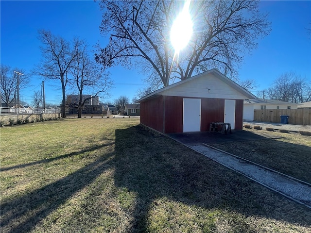 view of outdoor structure with a yard