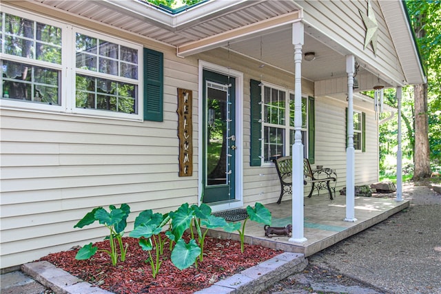 doorway to property featuring a porch