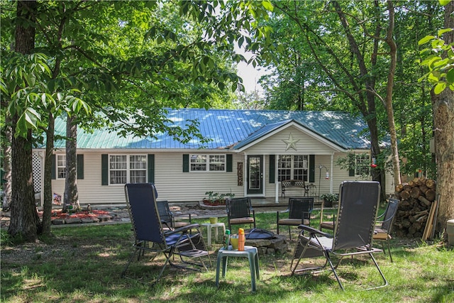 back of property featuring a patio area