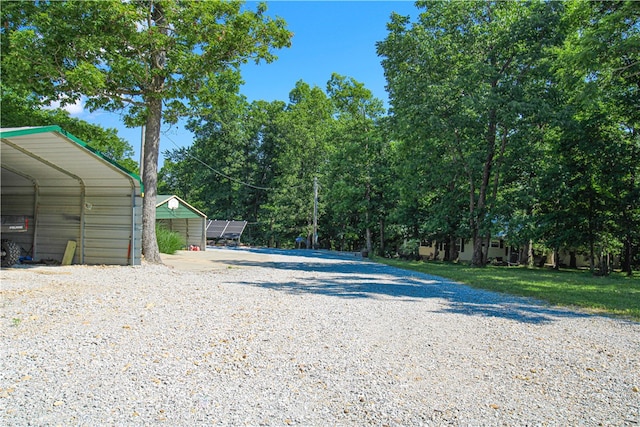 exterior space with a carport