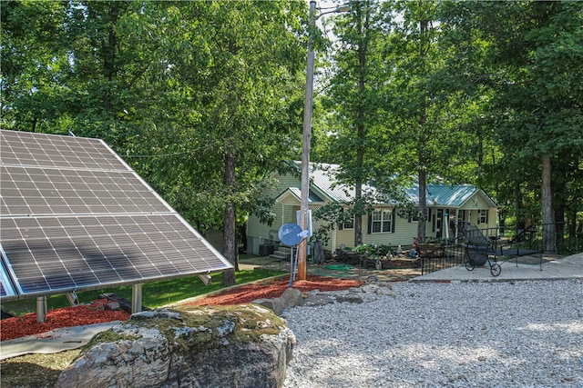 view of front of property with solar panels