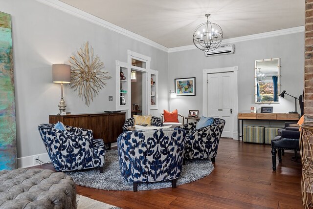 living room with dark wood-type flooring, crown molding, brick wall, a notable chandelier, and a wall unit AC