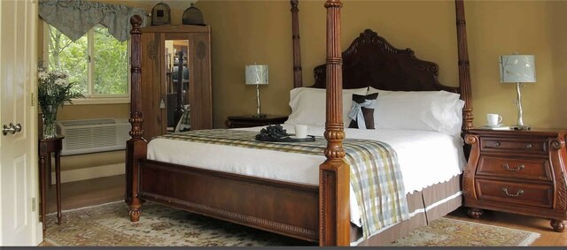 bedroom featuring light hardwood / wood-style floors