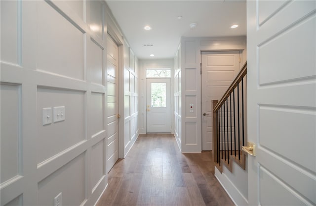 doorway to outside featuring hardwood / wood-style floors