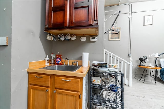 kitchen with butcher block countertops and sink