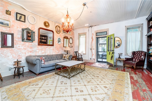 living room featuring a chandelier and hardwood / wood-style flooring