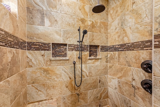 room details with a tile shower