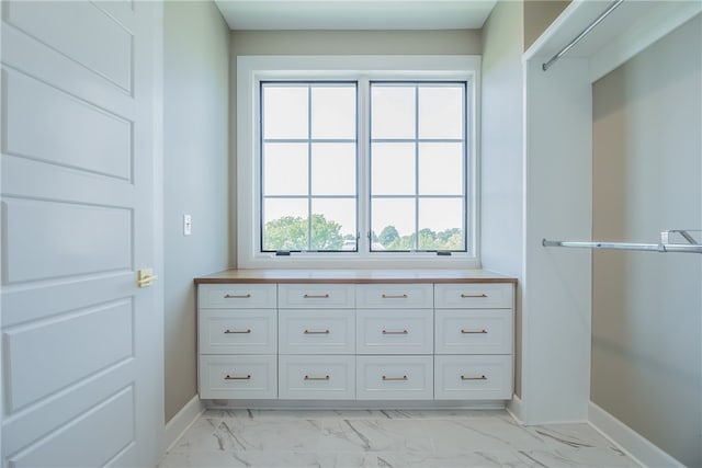 bathroom with tile flooring