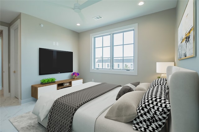 bedroom featuring ceiling fan and light tile floors