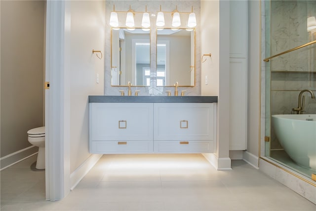 full bathroom featuring separate shower and tub, toilet, large vanity, and tile floors