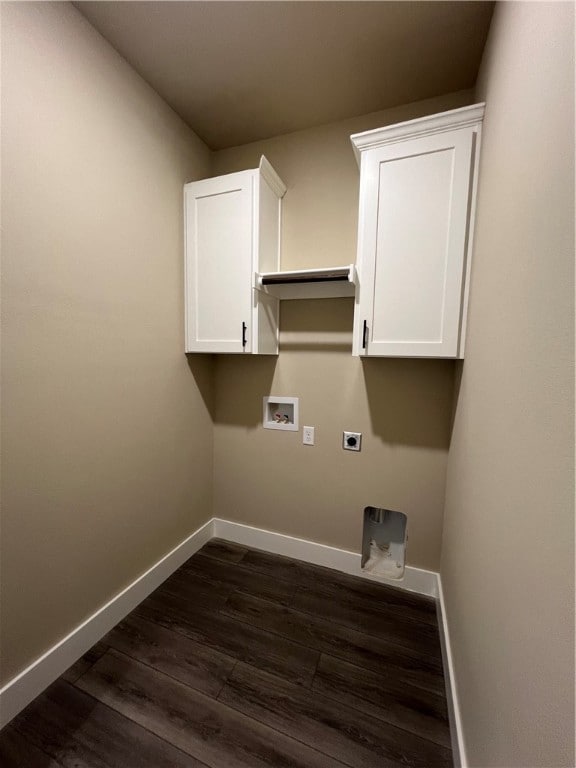 washroom with cabinets, light wood-type flooring, washer hookup, and electric dryer hookup