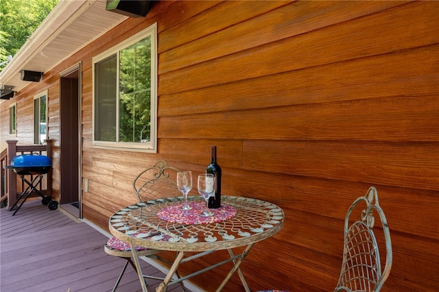 wooden deck featuring area for grilling