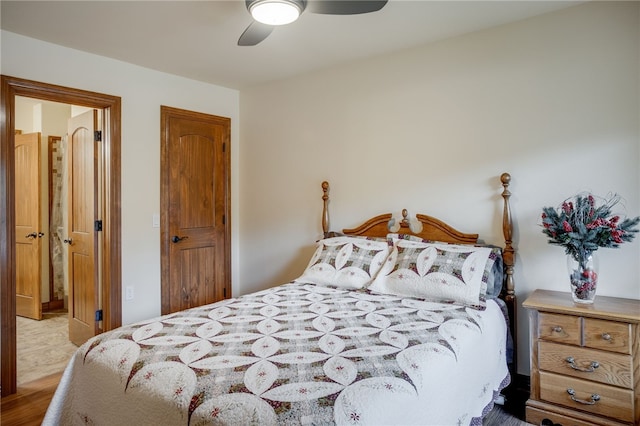 bedroom featuring ceiling fan and light hardwood / wood-style flooring