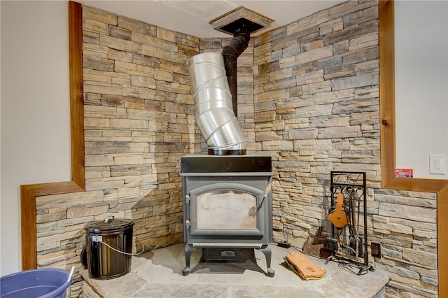 room details featuring a wood stove