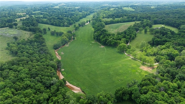 birds eye view of property with a rural view