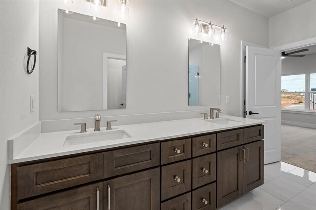3058 W Berkeley Ave, Rogers, AR 72758 - full bathroom with double vanity and ceiling fan