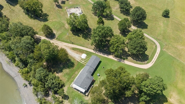 birds eye view of property featuring a rural view and a water view