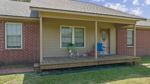 entrance to property with covered porch