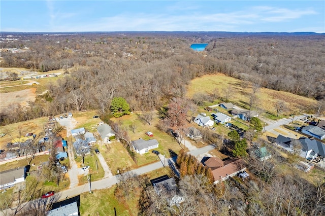 bird's eye view with a forest view and a residential view