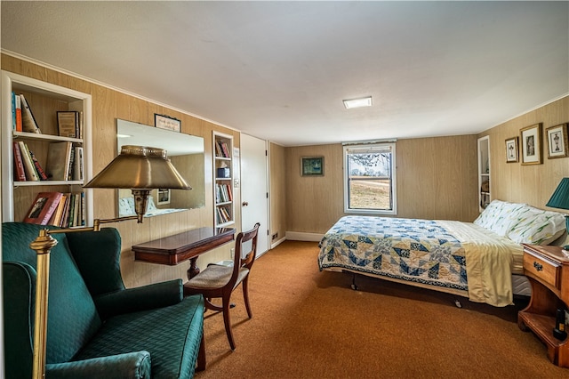 bedroom with carpet floors and wood walls