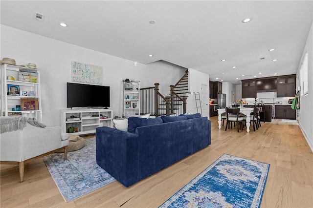 living room featuring light wood-type flooring