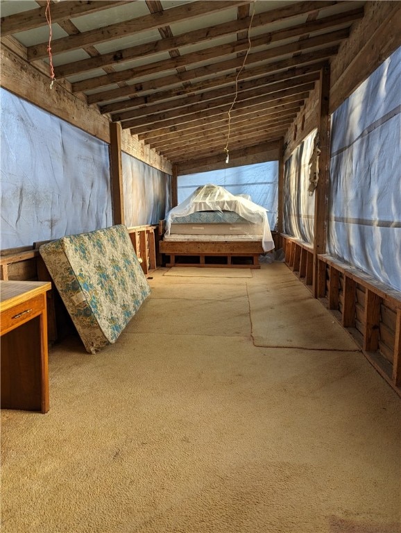 unfurnished bedroom featuring light carpet