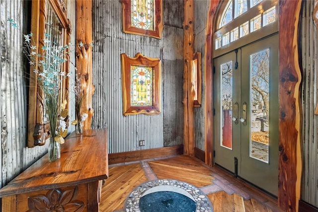 doorway to outside with french doors and hardwood / wood-style flooring