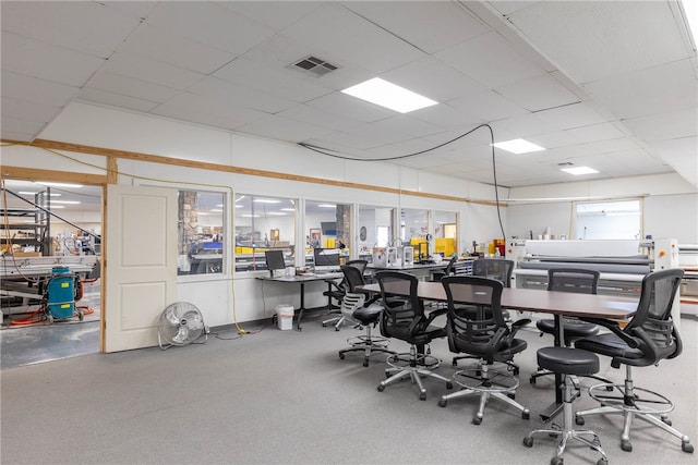 interior space featuring a paneled ceiling