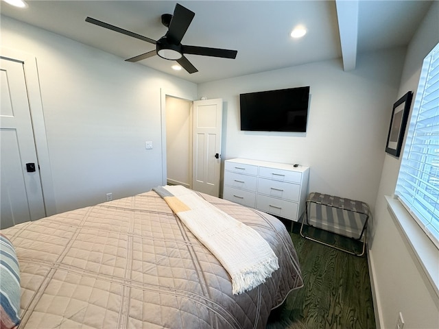 bedroom featuring hardwood / wood-style floors and ceiling fan