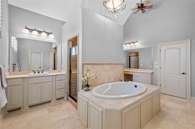 bathroom with high vaulted ceiling, separate shower and tub, ceiling fan with notable chandelier, and tile floors