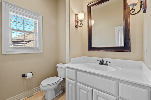 bathroom with oversized vanity, toilet, and tile floors