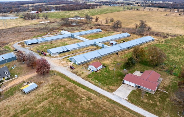 birds eye view of property featuring a rural view