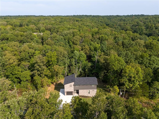 drone / aerial view with a forest view