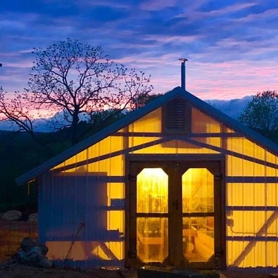 view of outdoor structure at dusk