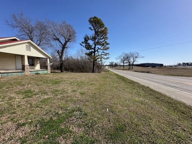 view of yard featuring a porch