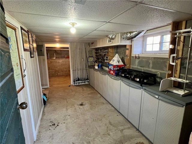 basement with a drop ceiling