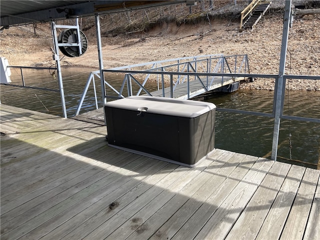 view of dock with a water view