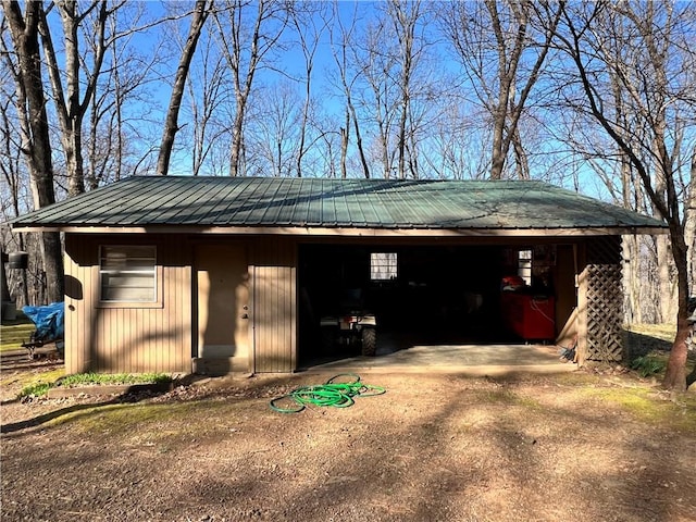 view of home's exterior featuring an outdoor structure