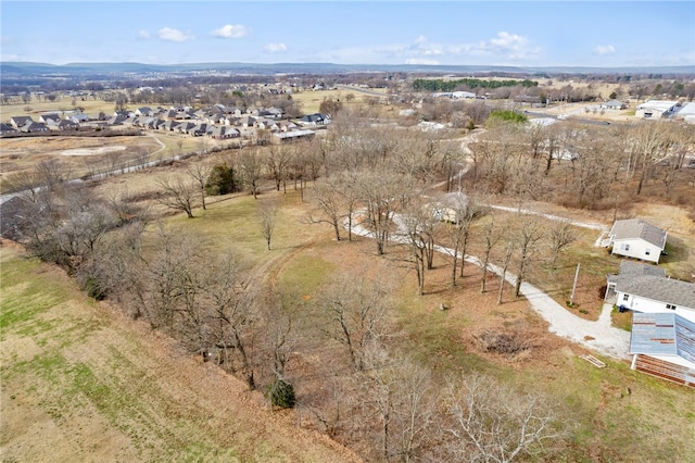 birds eye view of property featuring a rural view