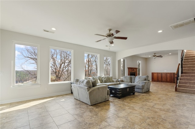 living room featuring ceiling fan