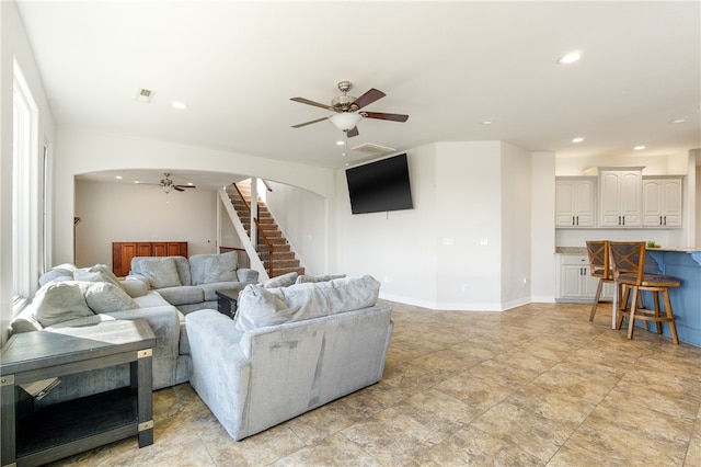 living room with ceiling fan