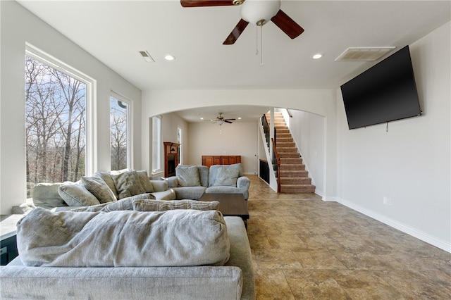 living room with ceiling fan