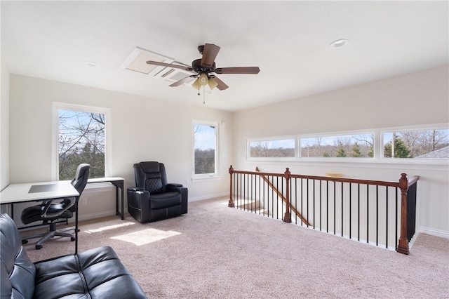 home office with ceiling fan, light carpet, and plenty of natural light