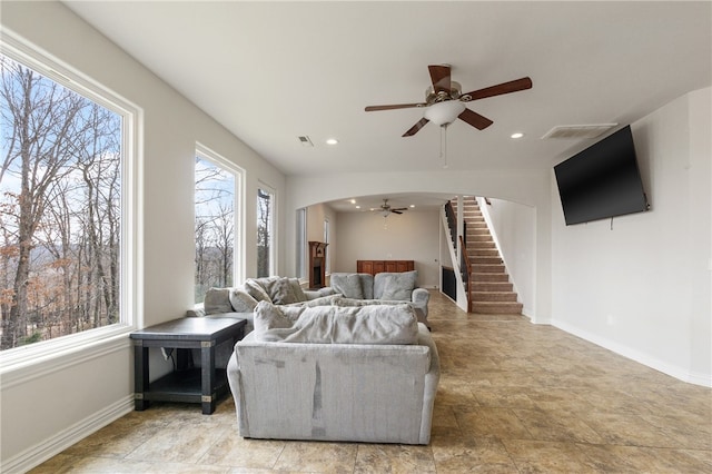 living room featuring ceiling fan